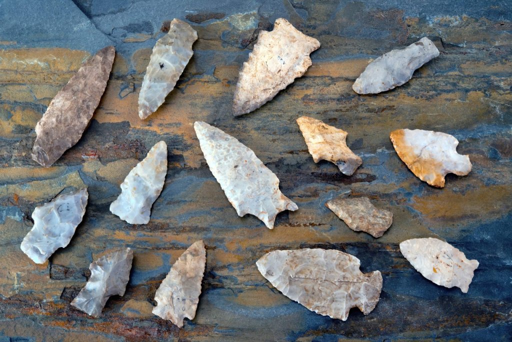 Arrowheads On A Table.